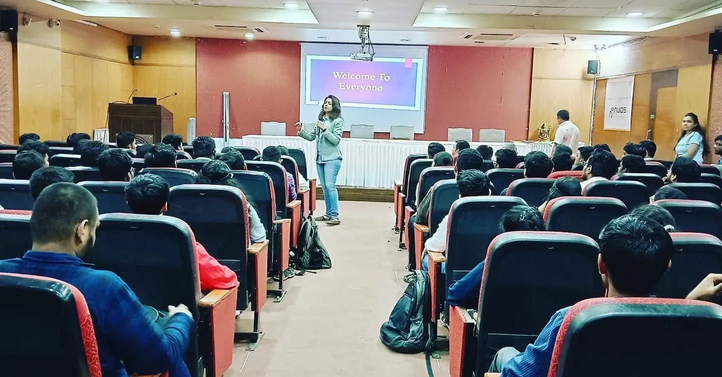 Sayali speaking to an audience